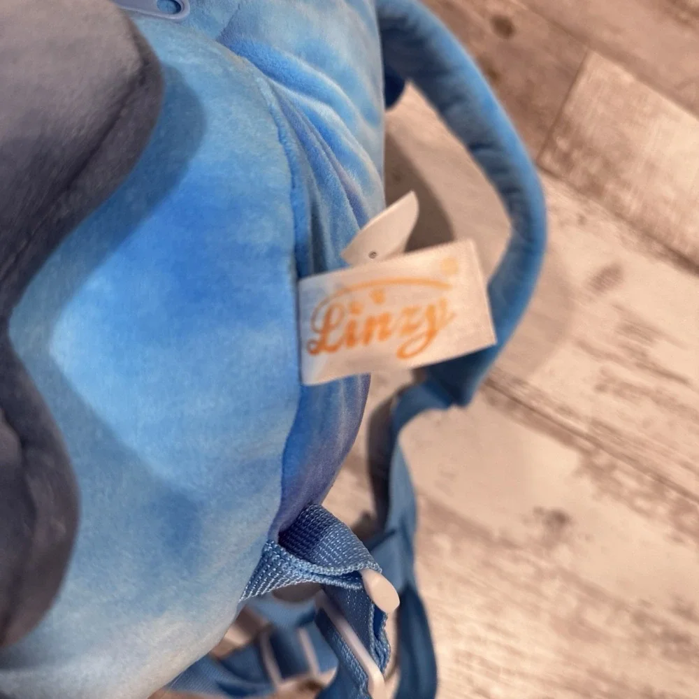 Linzy Plush Triceratops Backpack‎ Blue Tie Dye Dinosaur with Mini Clip Accessory